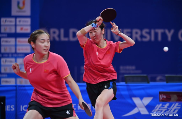 
                                    Китайские спортсменки завоевали золотые и серебряные медали в финале женского парного разряда по настольному теннису в рамках Универсиады в Чэнду
                                