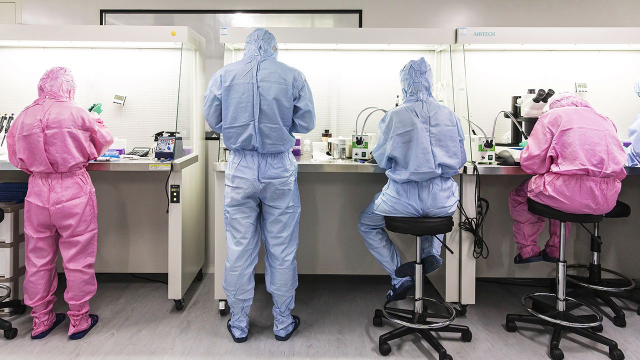 Technicians work inside a laboratory at a Cyagen Biosciences facility in Taicang, China