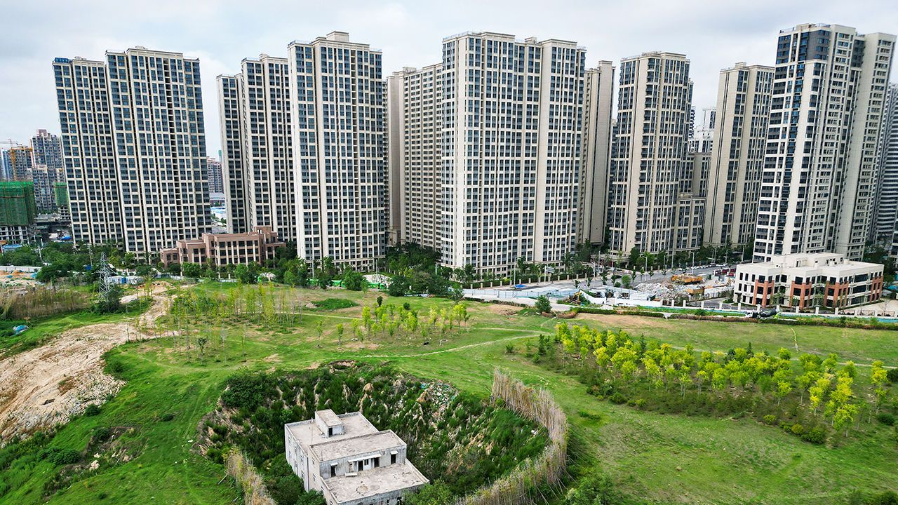An aerial view of the nail house in Zhengzhou, Henan Province of China. nail houses" are homes that remain standing amidst new developments due to homeowners refusing to move.