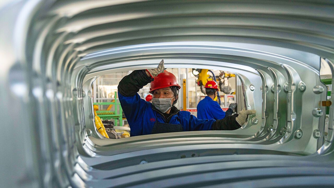 BYD employee works at an electric cars factory in China.