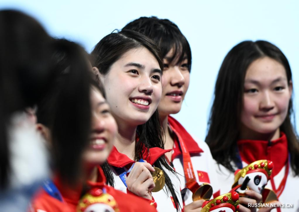 
                                    /Чэндуская Универсиада/ Женская сборная Китая по плаванию завоевала "золото" в эстафете 4x100 м вольным стилем 
                                