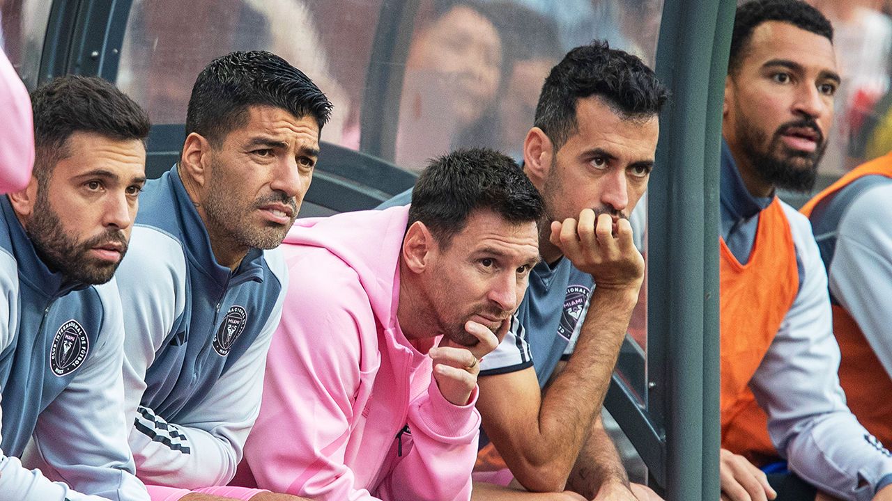 Inter Miami s Lionel Messi looks on from the bench during a football match between Hong Kong and Inter Miami CF